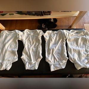 Plain white baby onsies